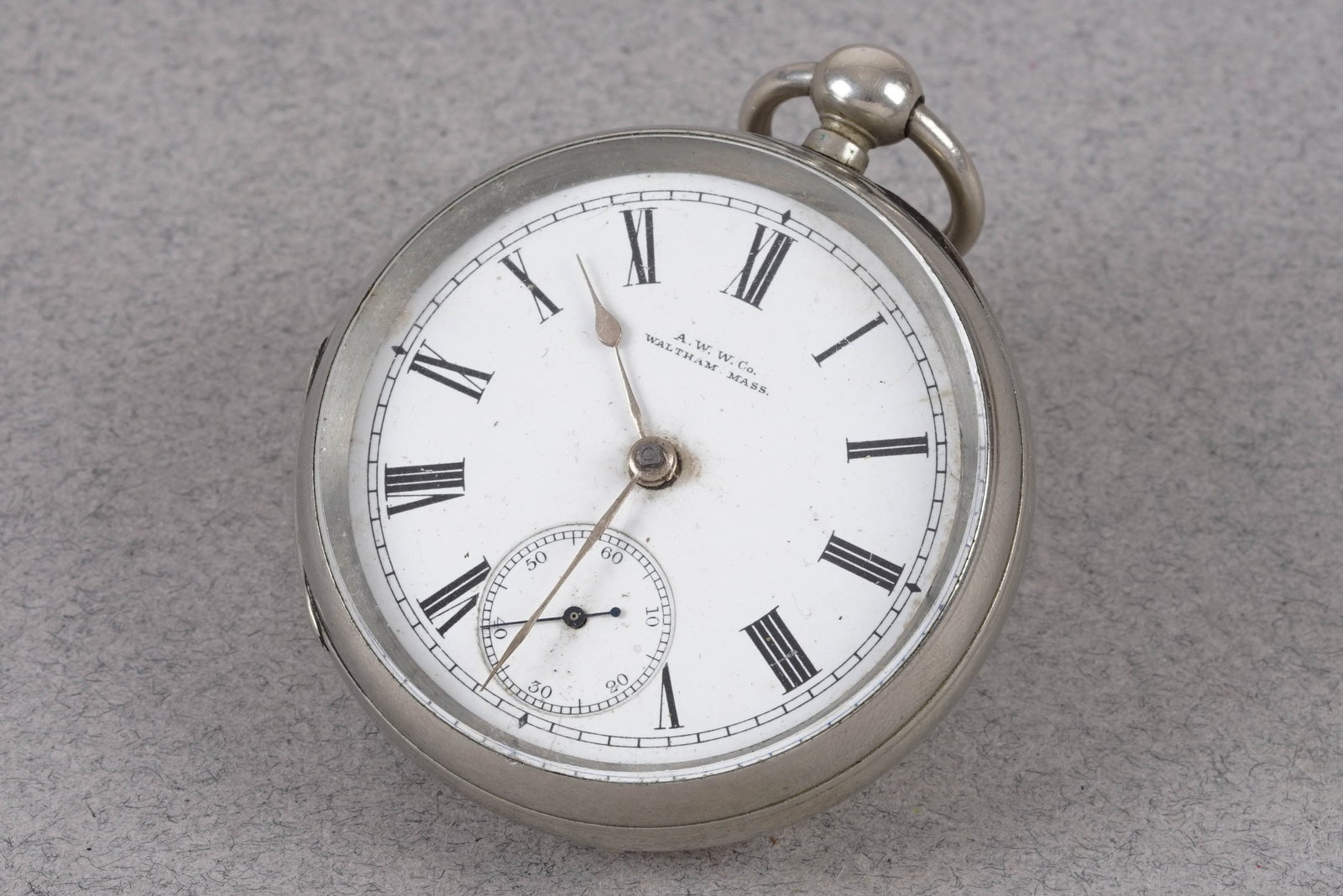 WALTHAM 925 STERLING SILVER POCKET WATCH: WALTHAM 925 STERLING SILVER POCKET WATCH , this watch has round white dial with subsidiary seconds dial with roman numeral hour markers and vintage hands. The 53mm 925 silver case has snap case back.