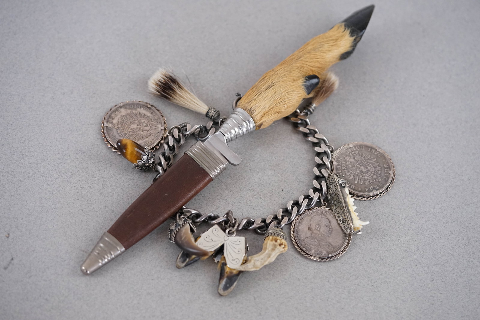 CHARIVARI SILVER COSTUME ORNAMENT W/ SOLINGEN KNIFE CIRCA 1900: Charivari silver costume bracelet/ornament gross weight 219.28gms plus solingendress knife