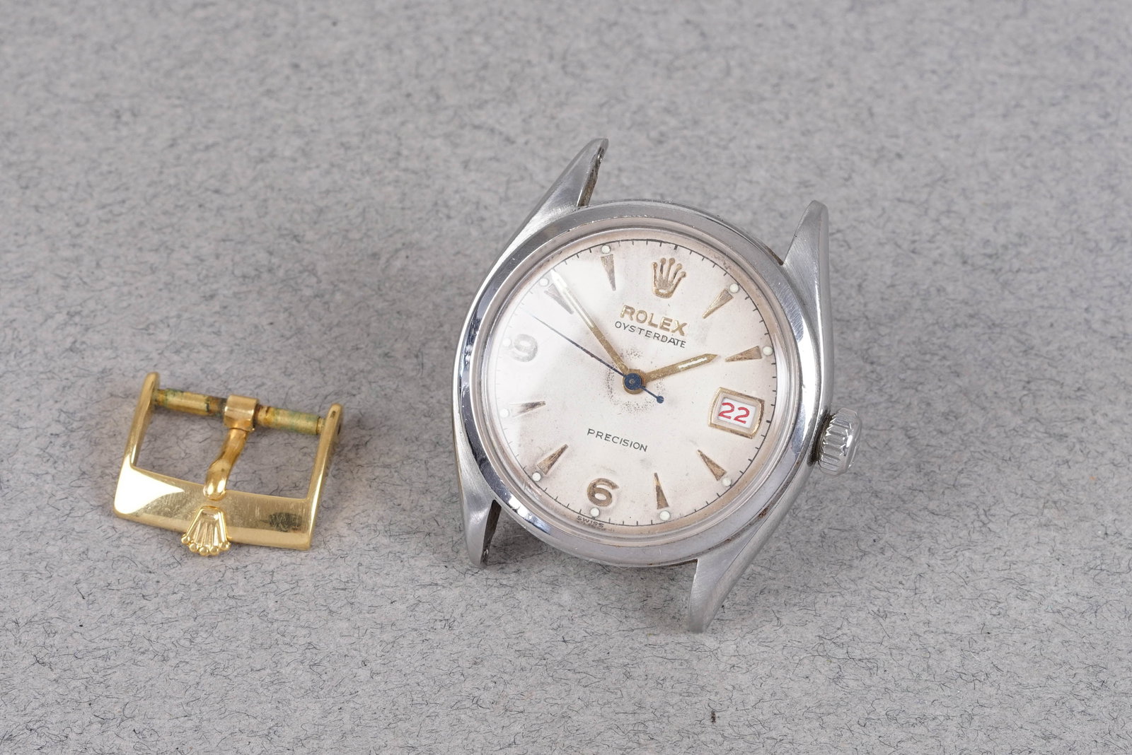 ROLEX OYSTERDATE PRECISION REF. 6094 CIRCA 1953: ROLEX OYSTERDATE PRECISION REF. 6094 CIRCA 1953, this watch is a ref. 6094 and is fitted with a circular white dial with roulette date, 3,6,9 hour markers and baton hands. The 34mm steel case is
