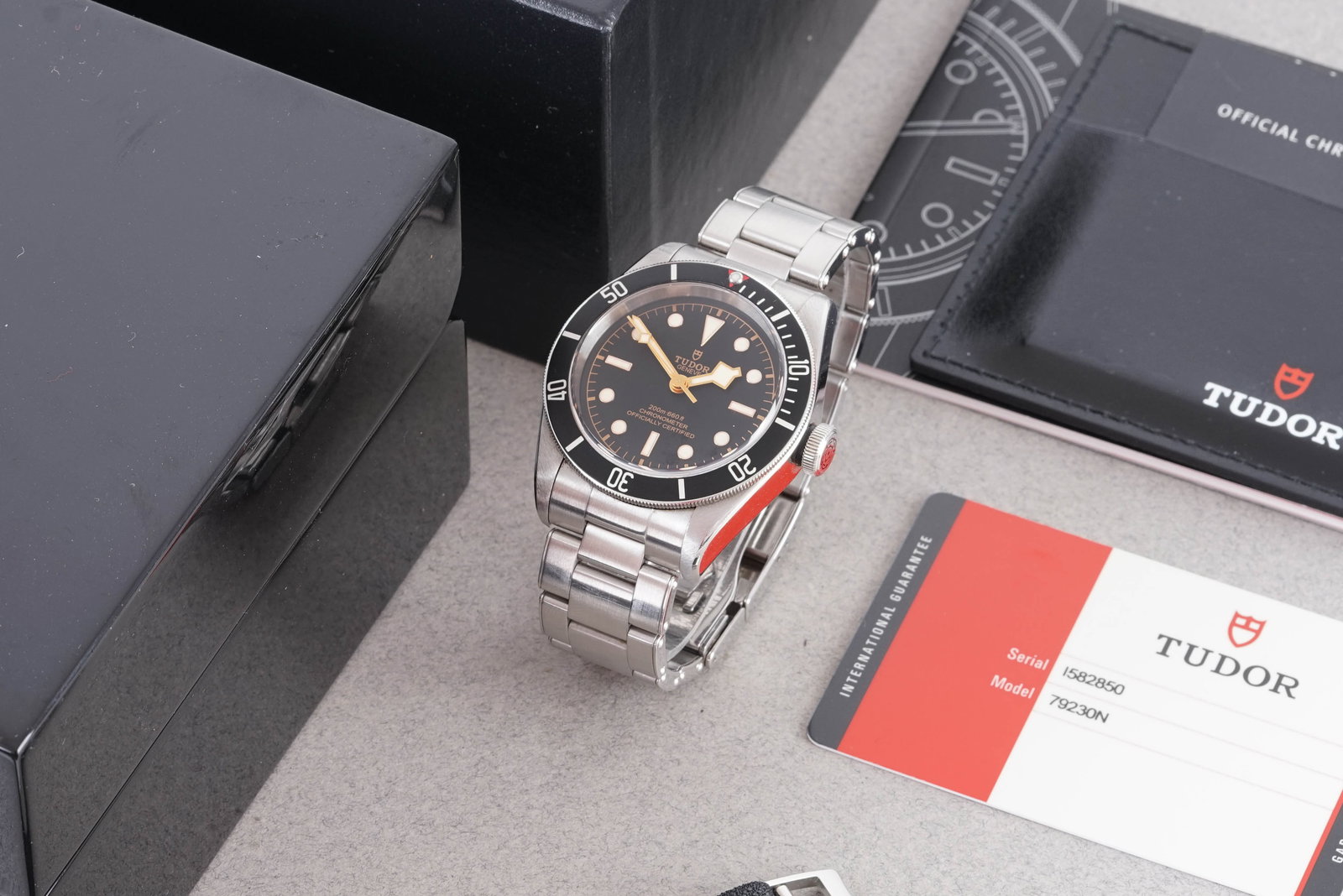 TUDOR HERITAGE BLACK BAY W/ BOX & GUARANTEE PAPERS REF. 79230N CIRCA 2016: TUDOR HERITAGE BLACK BAY W/ BOX & GUARANTEE PAPERS REF. 79230N CIRCA 2016, this watch is a ref. 79230N and is fitted with a circular black dial with lume plot hour markers and hands. The 41mm