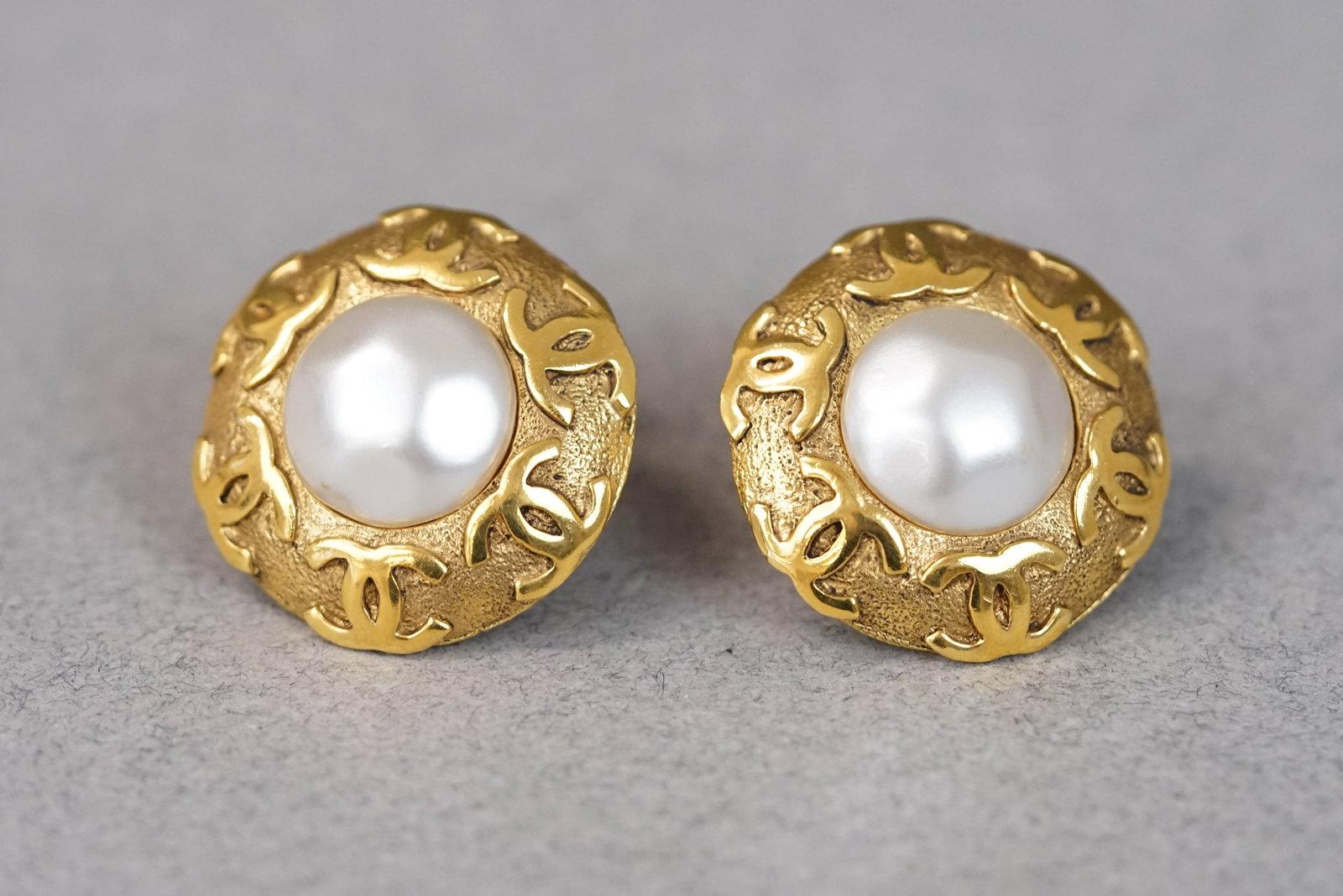 CHANEL EARRINGS: CHANEL EARRINGS, gold coloured faux pearl CC logo, clip on, dimensions 30mm. If you have any questions regarding this lot please contact us. For further information on our auction, please refer to