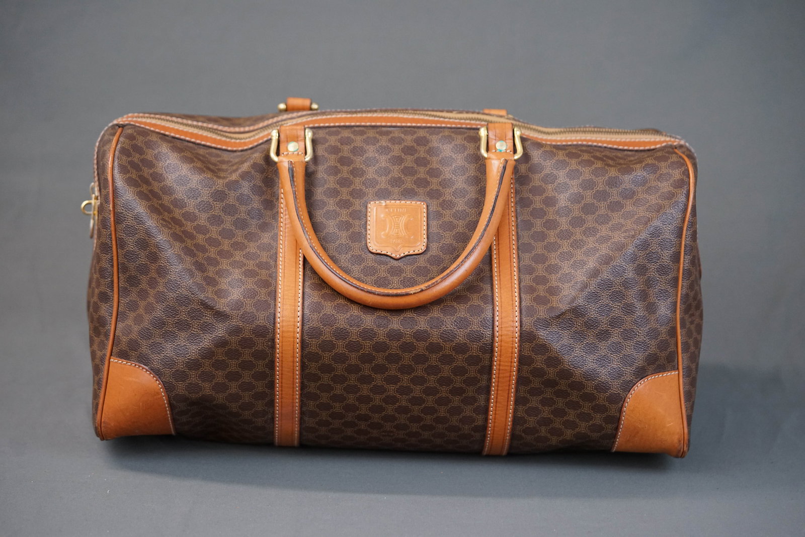 CELINE MACADAM BOSTON BAG: CELINE MACADAM BOSTON BAG, width 44cm, height 22cm, depth 22cm., with padlock and key If you have any questions regarding this lot please contact us. For further information on our auction, please ref