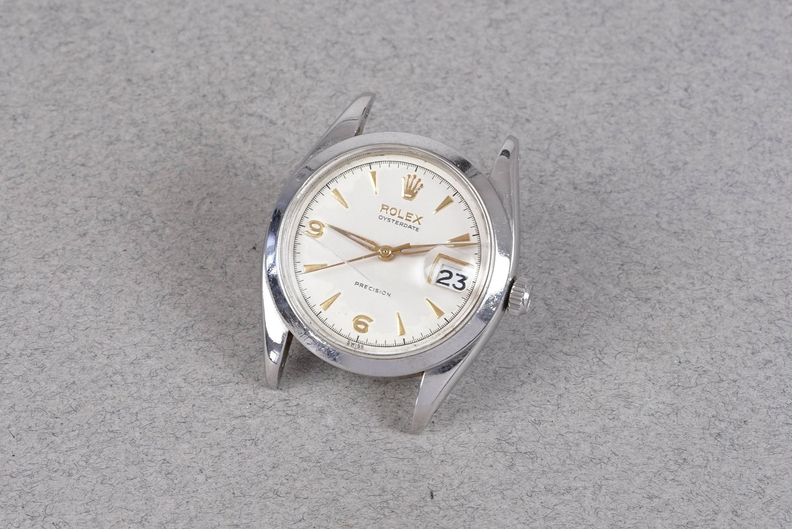 ROLEX OYSTERDATE PRECISION ROULETTE DATE WRISTWATCH: ROLEX OYSTERDATE PRECISION ROULETTE DATE WRISTWATCH, this watch is fitted with a circular white dial with a roulette date, 3,6,9 hour markers and dagger hands. The 35mm steel case is fitted with a