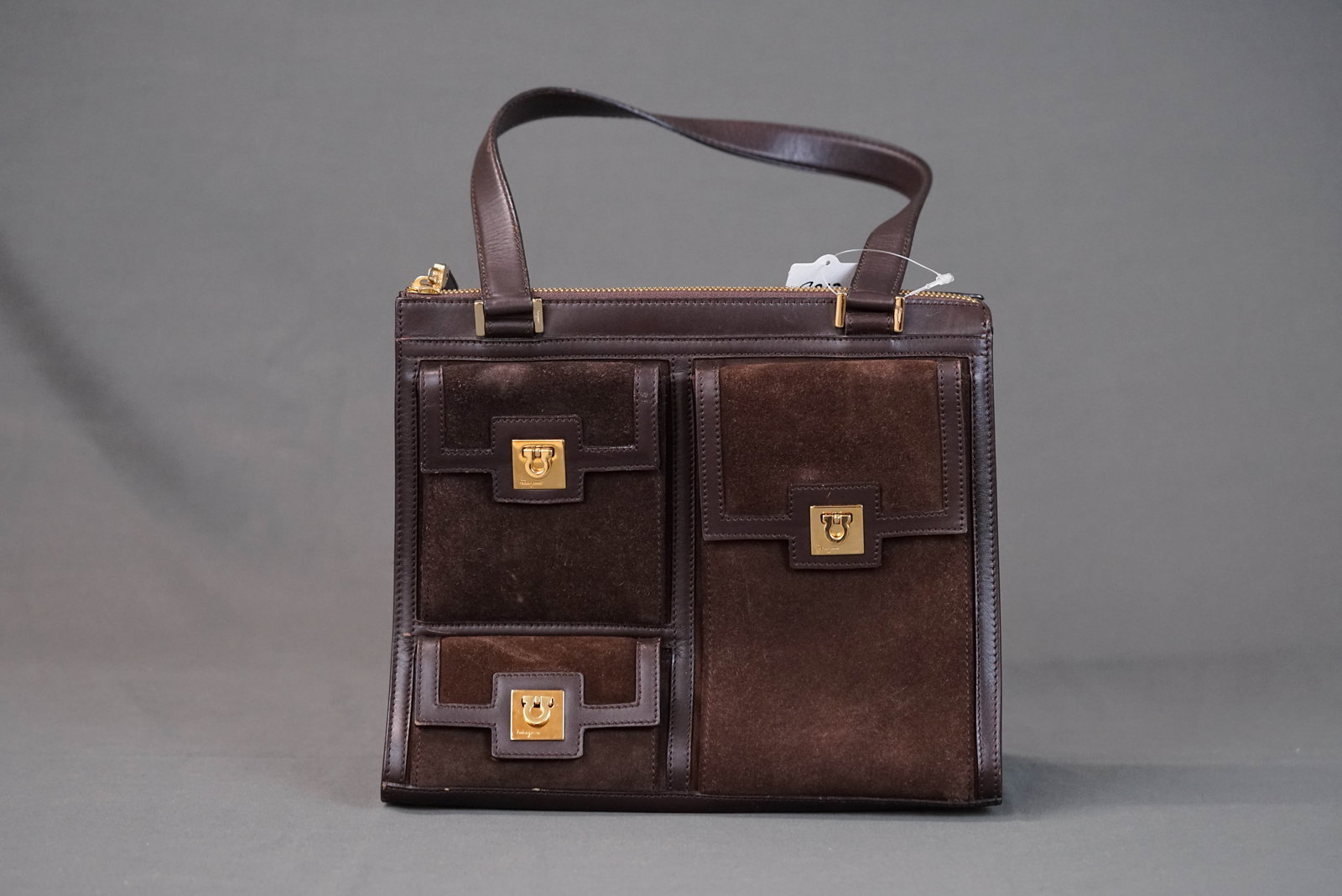 SALVATORE FERRAGAMO GANCINI LEATHER SUEDE SHOULDER BAG AQ 211909: SALVATORE FERRAGAMO GANCINI LEATHER SUEDE SHOULDER BAG AQ 211909, width 26cm, height 19cm, depth 12cm. If you have any questions regarding this lot please contact us. For further information on our