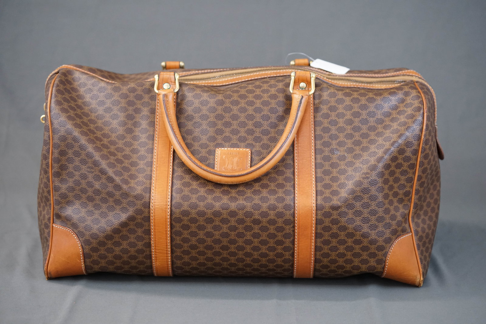CELINE MACADAM BOSTON BAG: CELINE MACADAM BOSTON BAG, condition rank BC, width 48cm, height 27cm, depth 23cm. If you have any questions regarding this lot please contact us. For further information on our auction, please refer