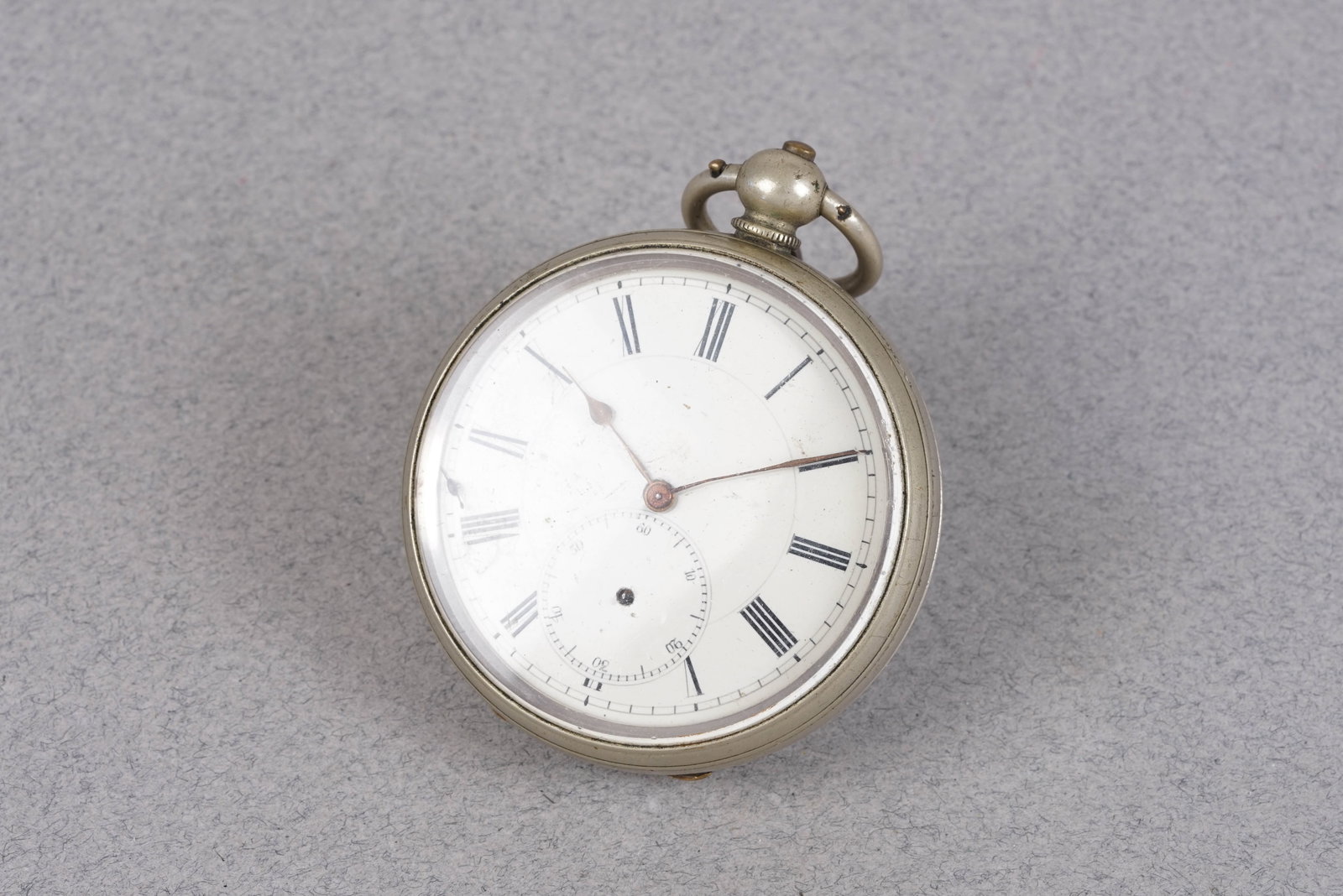 POCKET WATCH WHITE METAL STAMPED CIRCA 1920: POCKET WATCH WHITE METAL STAMPED CIRCA 1920, white enamel dial , 55mm open faced case, key wind movement currently not running. Gross weight 114grams. If you have any questions regarding this lot plea