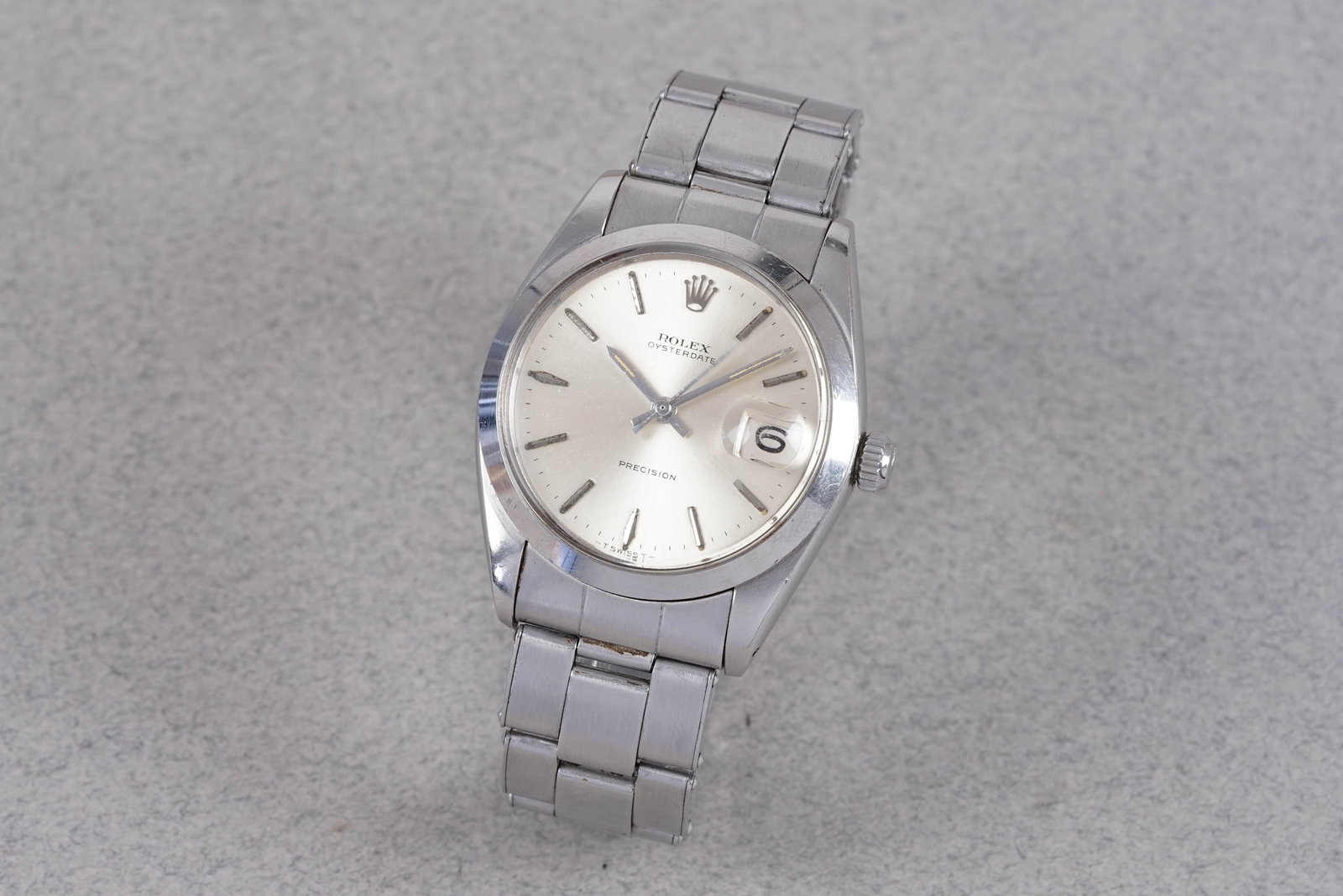 ROLEX OYSTERDATE PRECISION DATE WRISTWATCH: ROLEX OYSTERDATE PRECISION DATE WRISTWATCH, this watch is fitted with a circular silver dial with a date window at 3 o'clock, applied hour markers and hands. The 34mm stainless steel case is fitted wi