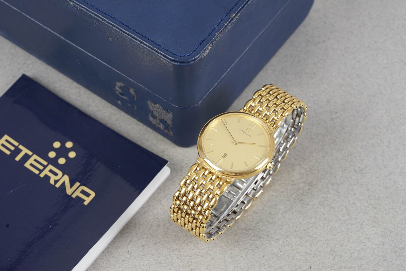 ETERNA GOLD PLATED DATE W/ BOX & PAPERS REF. 2007.22/20: ETERNA GOLD PLATED DATE W/ BOX & PAPERS REF. 2007.22/20, this watch is a ref. 2007.22/20 and is fitted with a circular champagne dial with a date window, applied stick hour markers and hands. The