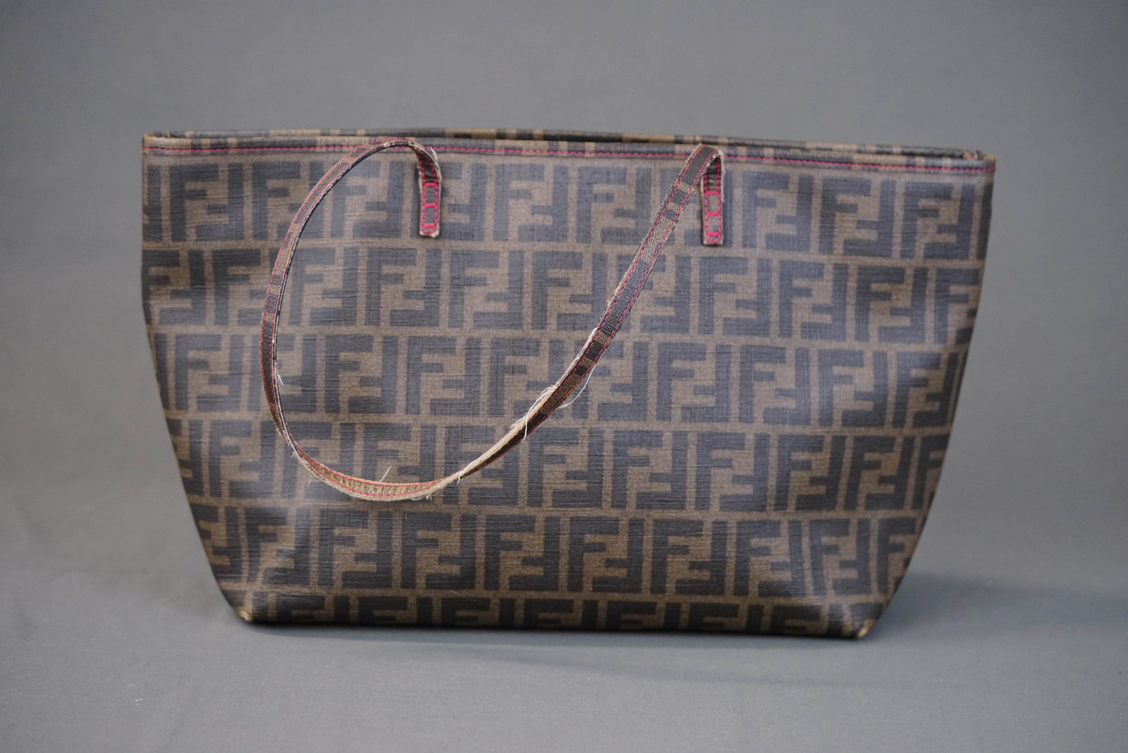 FENDI ZUCCA TOTE BAG AX51503: FENDI ZUCCA TOTE BAG AX51503, width 31cm, height 24cm, depth 13cm. If you have any questions regarding this lot please contact us. For further information on our auction, please refer to our T & C