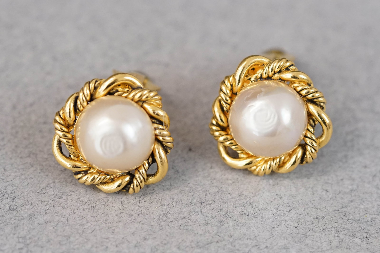 CHANEL EARRINGS: CHANEL EARRINGS, gold coloured faux pearl, clip on, dimensions 21mm. If you have any questions regarding this lot please contact us. For further information on our auction, please refer to our T