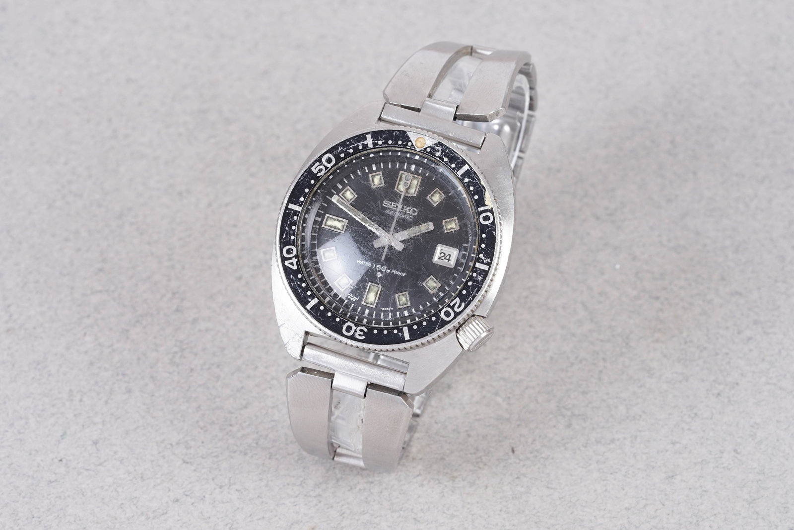 SEIKO SCUBA AUTOMATIC DIVERS WATCH REF. 6105-8000: SEIKO SCUBA AUTOMATIC DIVERS WATCH REF. 6105-8000 , this watch is a ref. 6105-8000 and is fitted with a circular black dial with a date window, applied hour markers and hands. The 41mm stainless