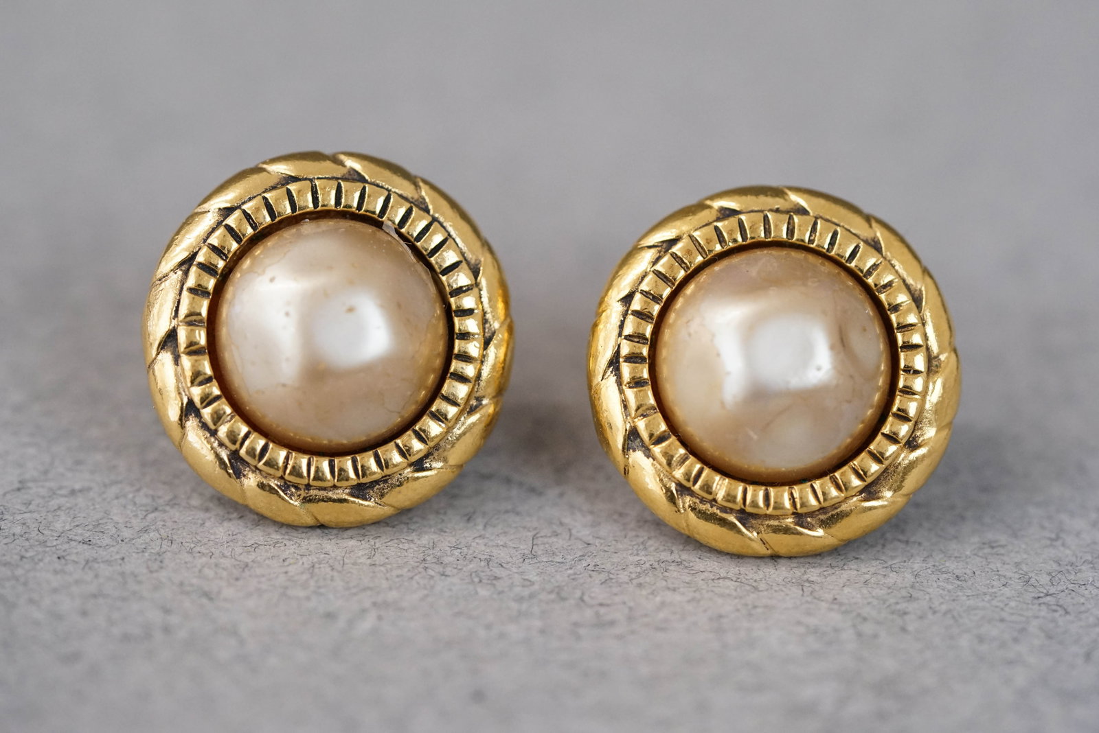 CHANEL EARRINGS: CHANEL EARRINGS, gold coloured faux pearl, clip on, dimensions 23mm. If you have any questions regarding this lot please contact us. For further information on our auction, please refer to our T
