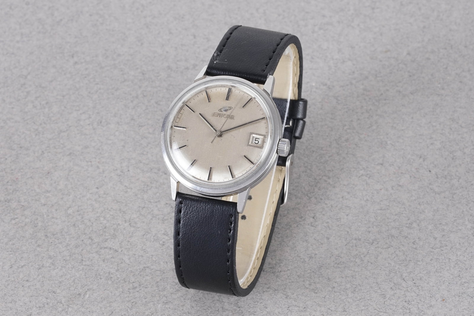 ENICAR OCEAN PEARL WRISTWATCH: ENICAR OCEAN PEARL WRISTWATCH, this watch is fitted with a circular silver dial with hour markers and hands. The 35mm stainless steel case is fitted with a crown and a case back. Inside is a manually