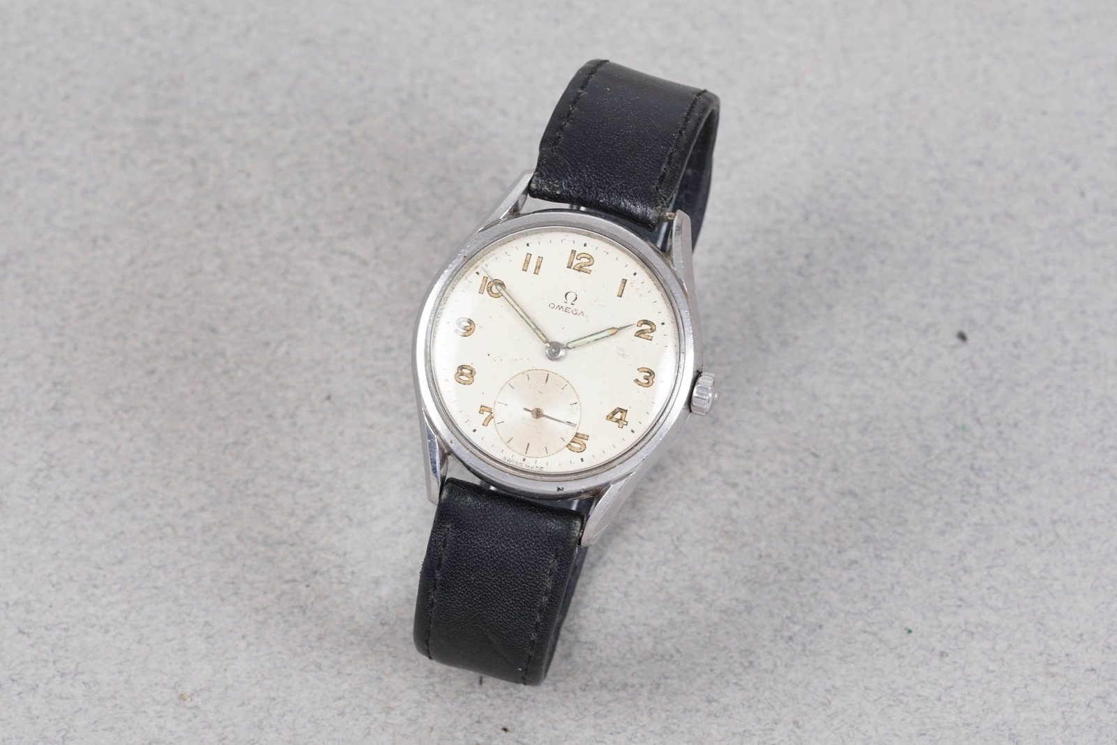 OMEGA ARABIC DIAL WRISTWATCH REF. 2791: OMEGA OVERSIZE ARABIC DIAL WRISTWATCH REF. 2791, this watch is fitted with a white dial with sub seconds, numerical hour markers and pencil hands. The 36mm steel case is fitted with an omega crown