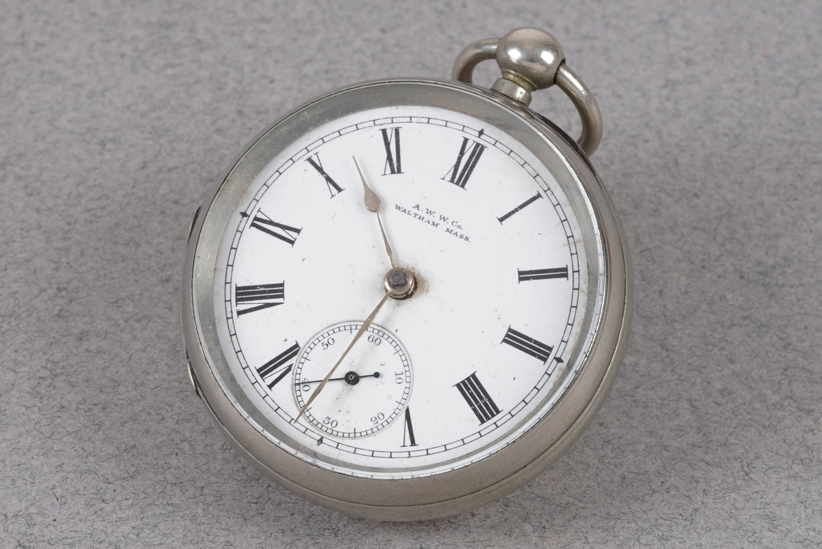 WALTHAM 925 STERLING SILVER POCKET WATCH CIRCA: WALTHAM 925 STERLING SILVER POCKET WATCH , this watch has round white dial with subsidiary seconds dial with roman numeral hour markers and vintage hands. The 53mm 925 silver case has snap case back.