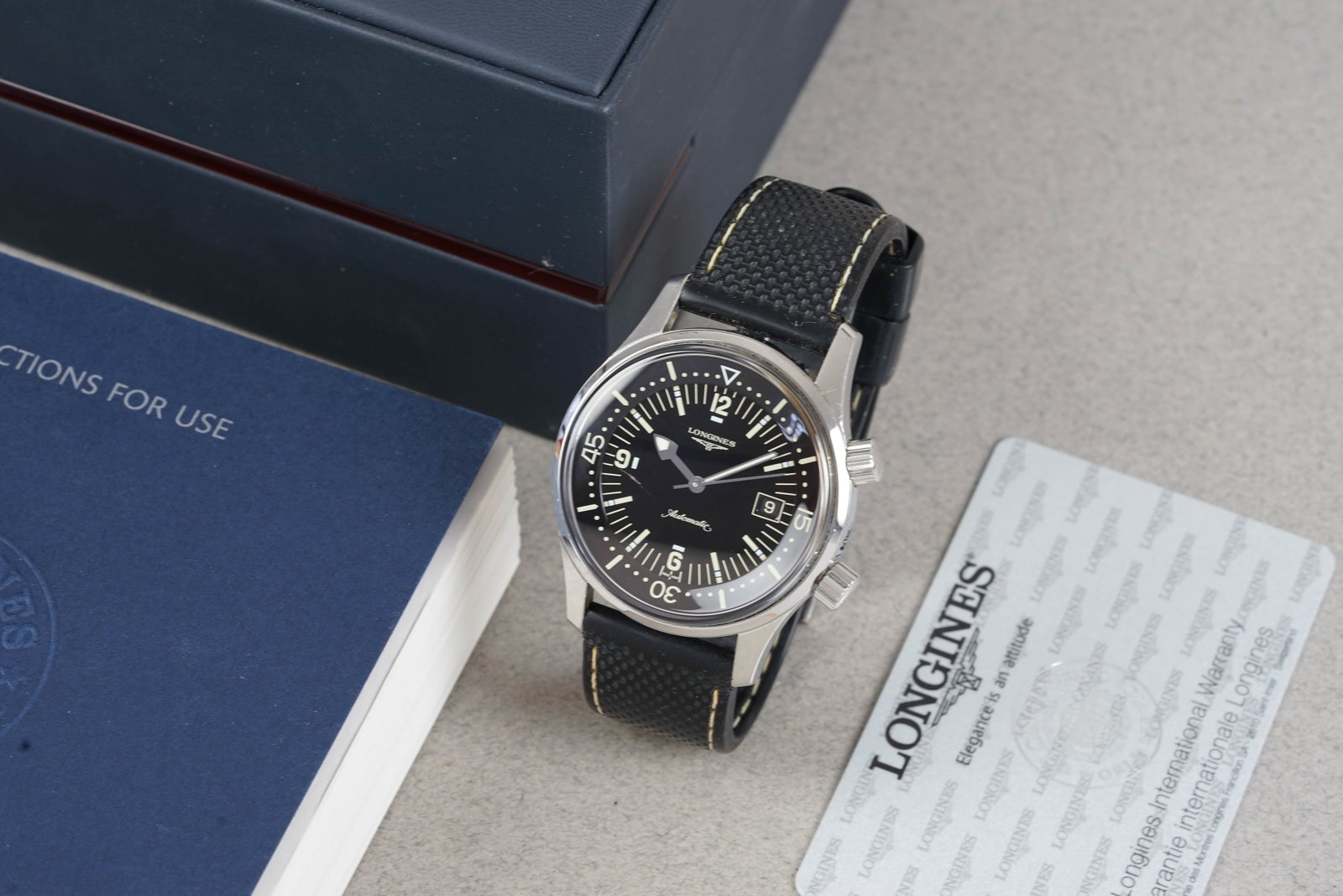 LONGINES LEGEND DIVER AUTOMATIC W/ BOX & GUARANTEE CARD REF. L36744 CIRCA 2011: LONGINES LEGEND DIVER AUTOMATIC W/ BOX & GUARANTEE CARD REF. L36744 CIRCA 2011, this watch is a ref. L36744 and is fitted with a circular black dial with a date window mixed hour markers and