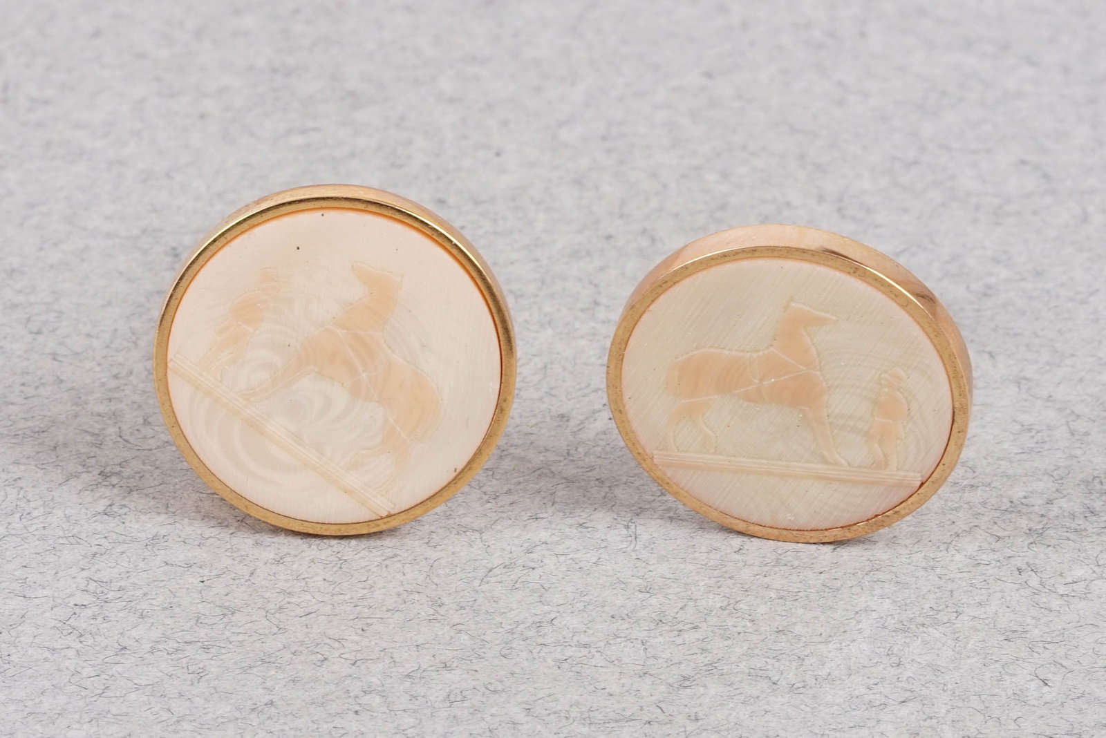 HERMES COROZO EARRINGS: HERMES COROZO EARRINGS, Hermes corozo earrings plated, diameter 22mm approx. clip on. If you have any questions regarding this lot please contact us. For further information on our auction, please