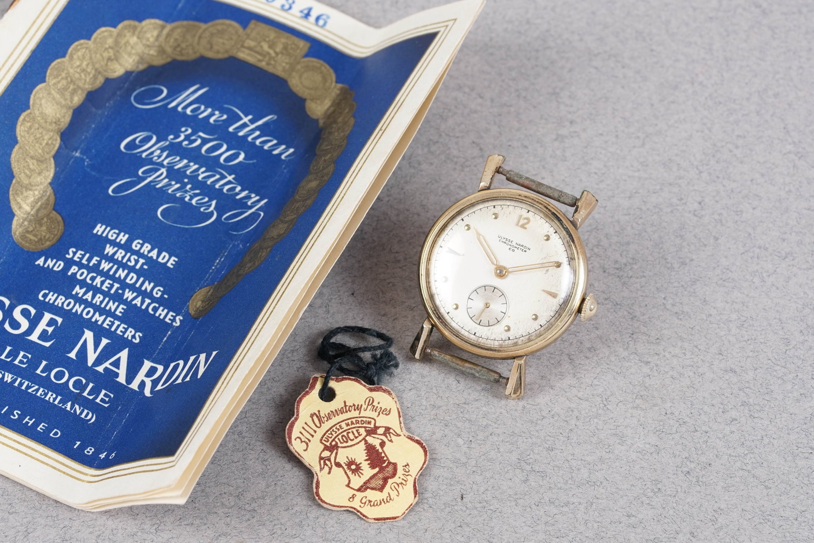 ULYSSE NARDIN GOLD PLATED CHRONOMETER W/ GUARANTEE PAPERS: ULYSSE NARDIN GOLD PLATED CHRONOMETER W/ GUARANTEE PAPERS, this watch is fitted with a circular patina dial, dot/dagger hour markers and pencil hands (Lume missing). The 31mm plated case is fitted