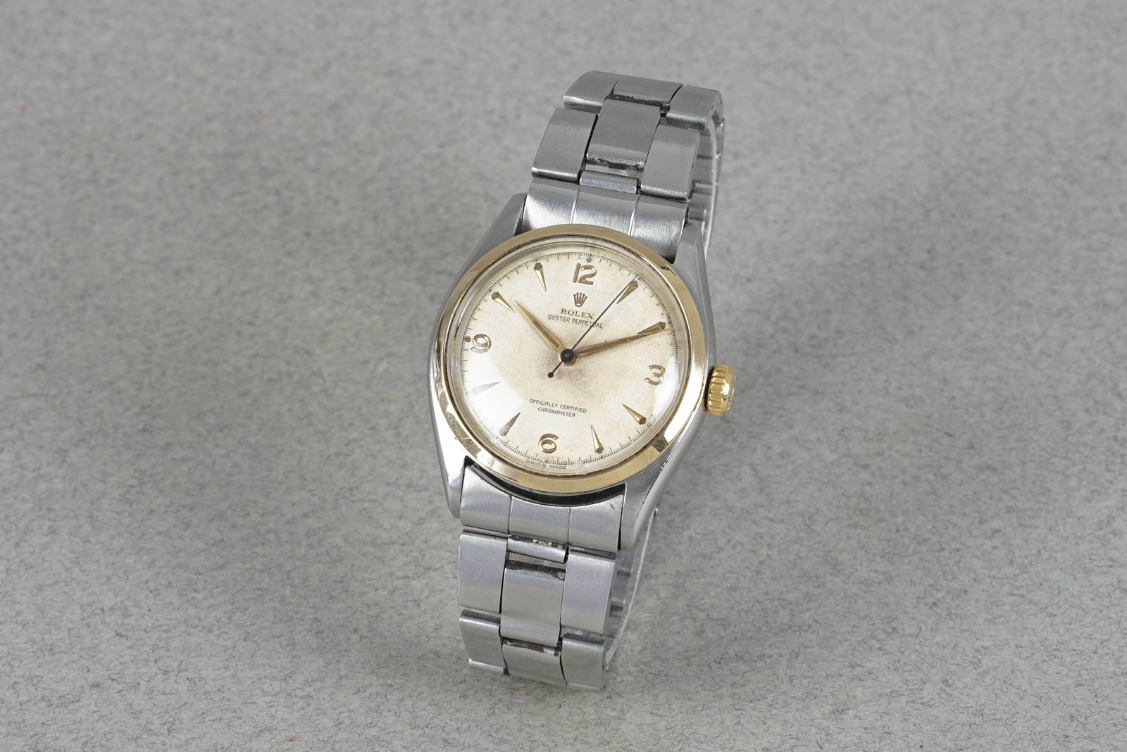 ROLEX OYSTER PERPETUAL STEEL & GOLD WRISTWATCH REF. 6084 CIRCA 1952 - 2