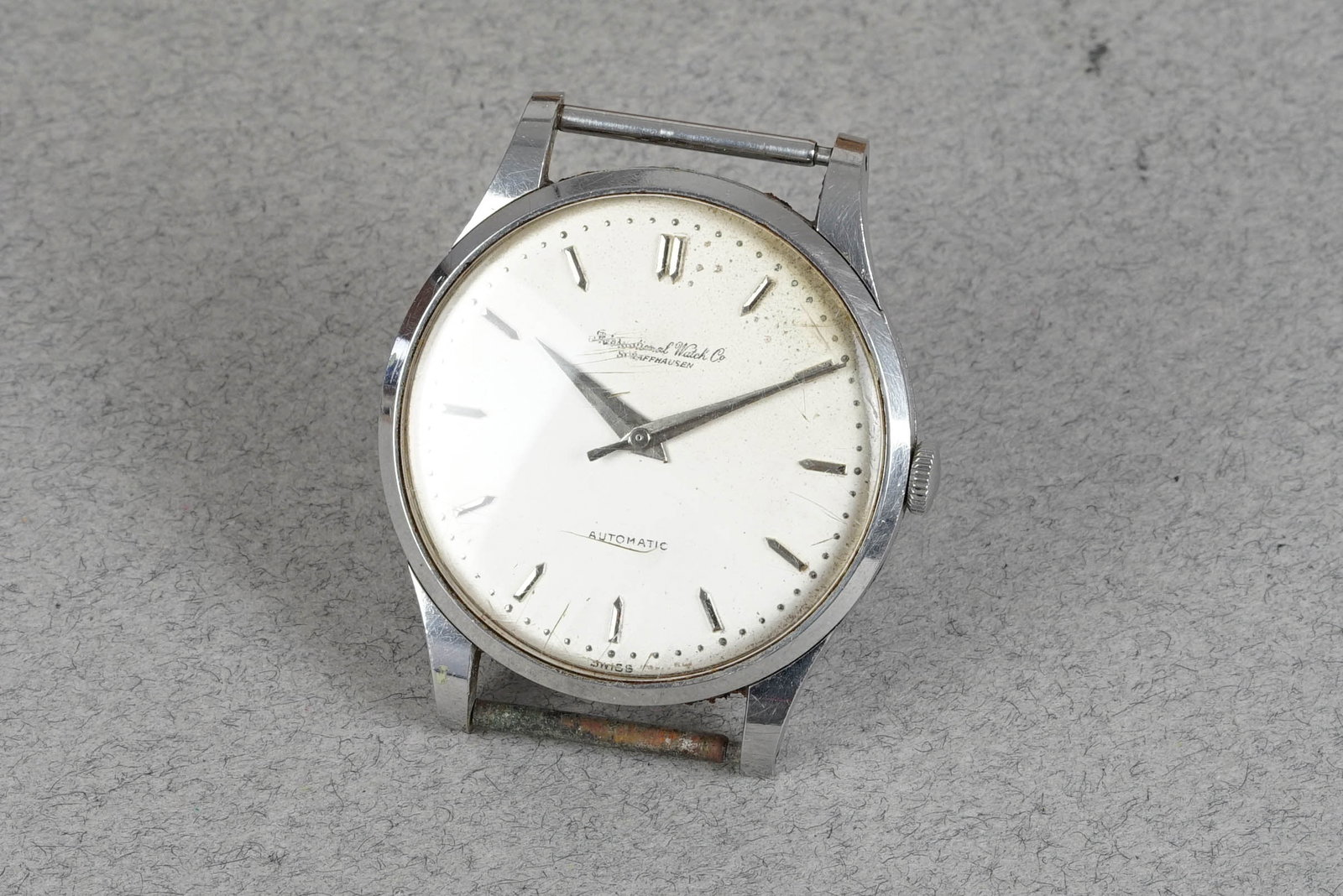 IWC SCHAFFHAUSEN CALATRAVA AUTOMATIC WRISTWATCH: IWC SCHAFFHAUSEN CALATRAVA AUTOMATIC WRISTWATCH DIAL: Off white dial with indices, Dauphine hands CASE: 34mm stainless steel, snap case back MOVEMENT: Automatic, IWC calibre BRACELET OR STRAP: