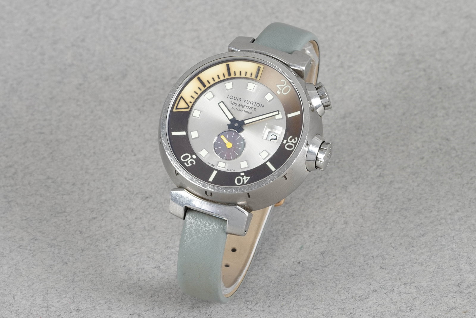 LOUIS VUITTON TAMBOUR DIVING AUTOMATIC WRISTWATCH REF. Q103M: LOUIS VUITTON TAMBOUR DIVING AUTOMATIC WRISTWATCH REF. Q103M DIAL: Circular silver grey dial, brown inner bezel, date window and sub dial CASE: 43mm stainless steel case, screw down crown, inner