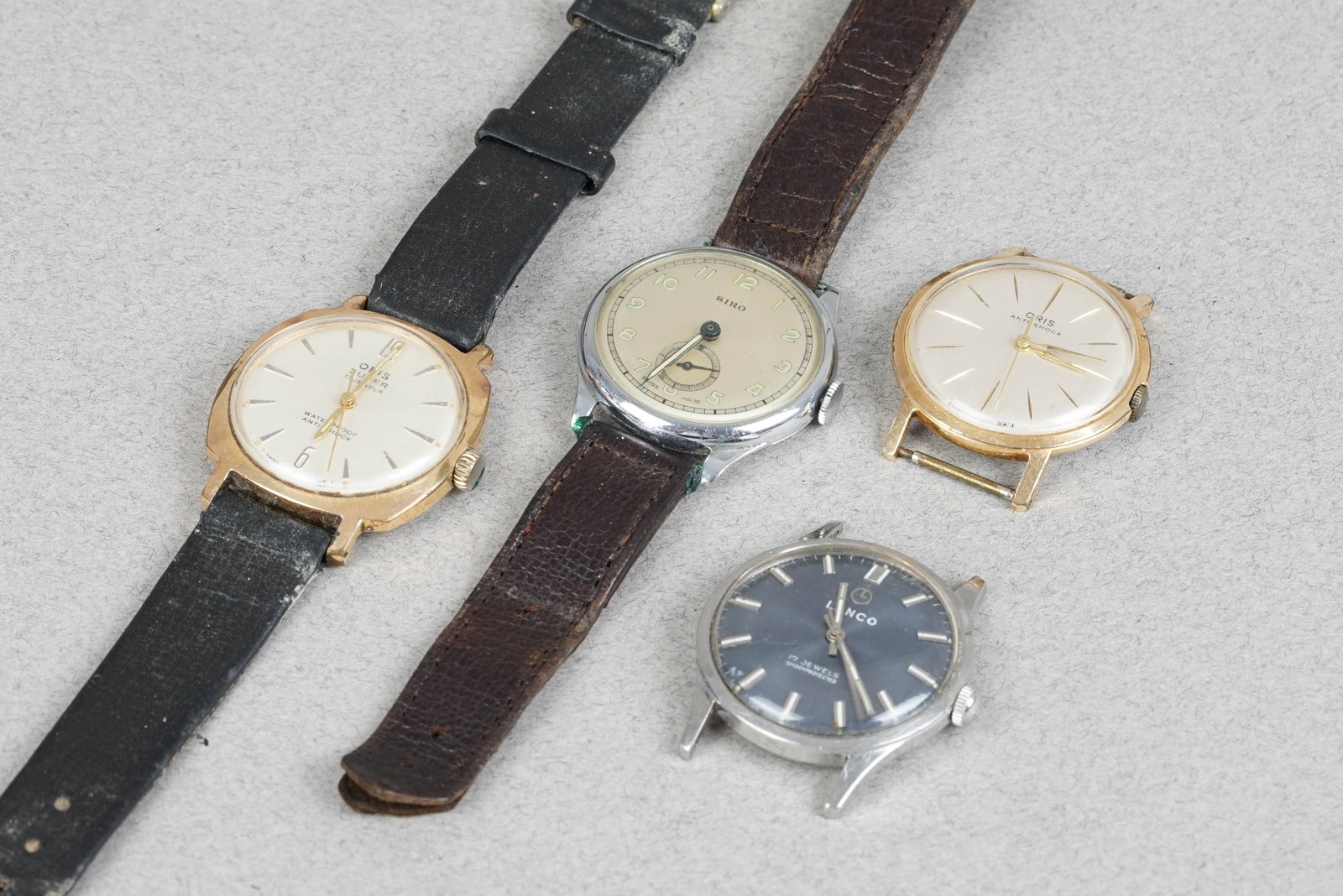 GROUP OF 4 VINTAGE WATCHES INCL. LANCO ORIS: GROUP OF 4 VINTAGE WATCHES INCL. LANCO ORIS DIAL: Various vintage dial styles including Lanco and Oris brands CASE: Vintage stainless steel cases, various sizes MOVEMENT: Manually wound movements