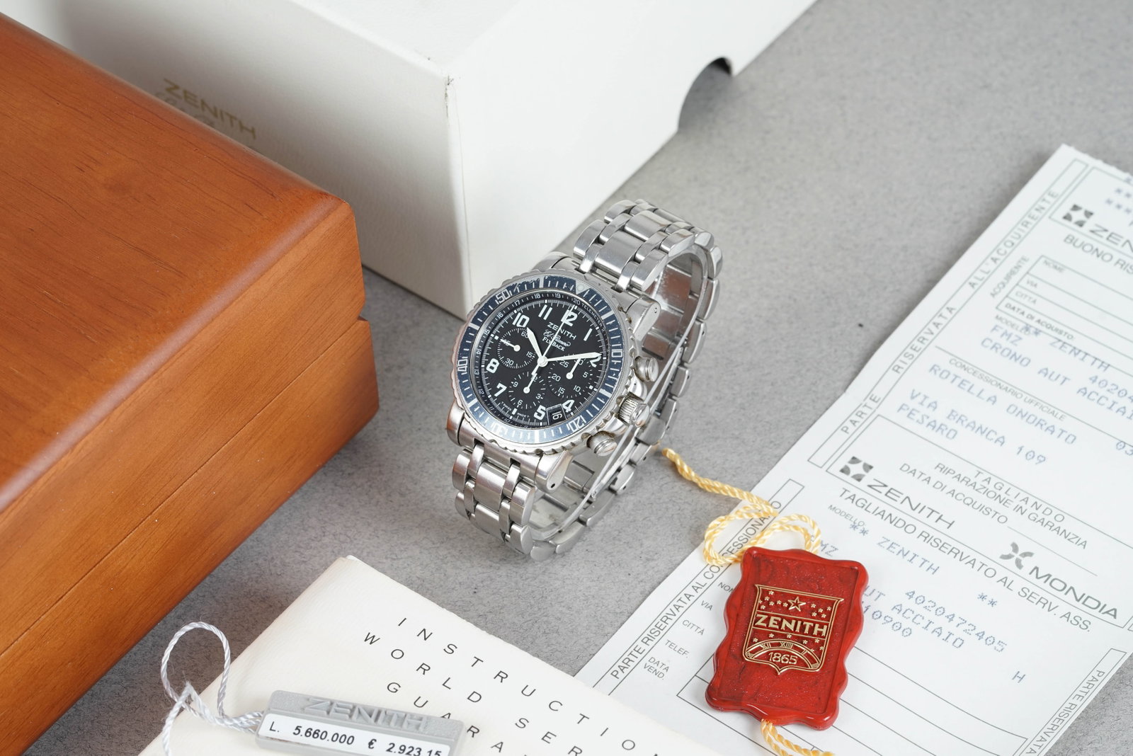 ZENITH EL PRIMERO RAINBOW FLYBACK CHRONOGRAPH W/ BOX REF. 02.0470.405: ZENITH EL PRIMERO RAINBOW FLYBACK CHRONOGRAPH W/ BOX REF. 02 DIAL: Black dial with chronograph sub dials, applied indices, tachymeter scale CASE: 40mm stainless steel, screw-down case back, flyback