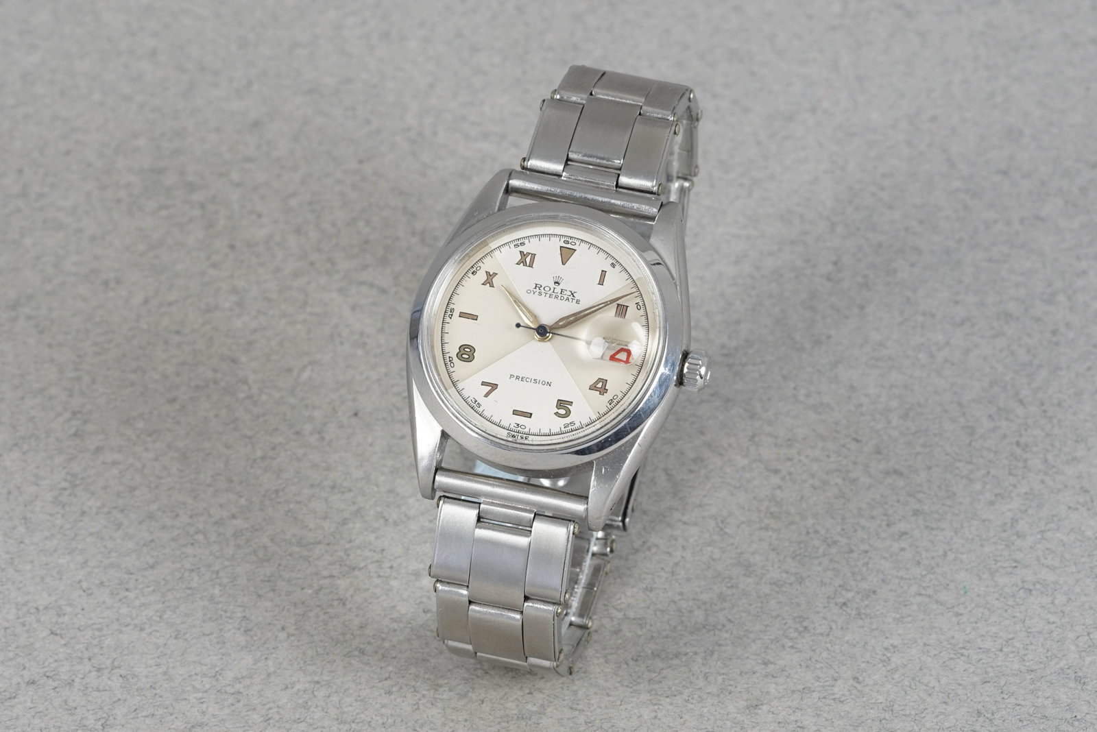 ROLEX OYSTERDATE PRECISION REF. 6694 CIRCA 1960: ROLEX OYSTERDATE PRECISION REF. 6694 CIRCA 1960 DIAL: circular sector dial (believed to be repainted, date window, dagger hands, California hour markers CASE: 34mm steel case, screw back MOVEMENT: