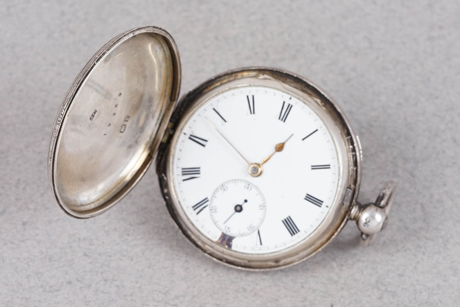 *TO BE SOLD WITHOUT RESERVE* ANTIQUE STERLING SILVER FULL HUNTER POCKET WATCH: *TO BE SOLD WITHOUT RESERVE* ANTIQUE STERLING SILVER FULL HUNTER POCKET WATCH, white enamel dial, 50mm full hunter case, key wind movement currently not running. Gross weight 100 grams. If you have an