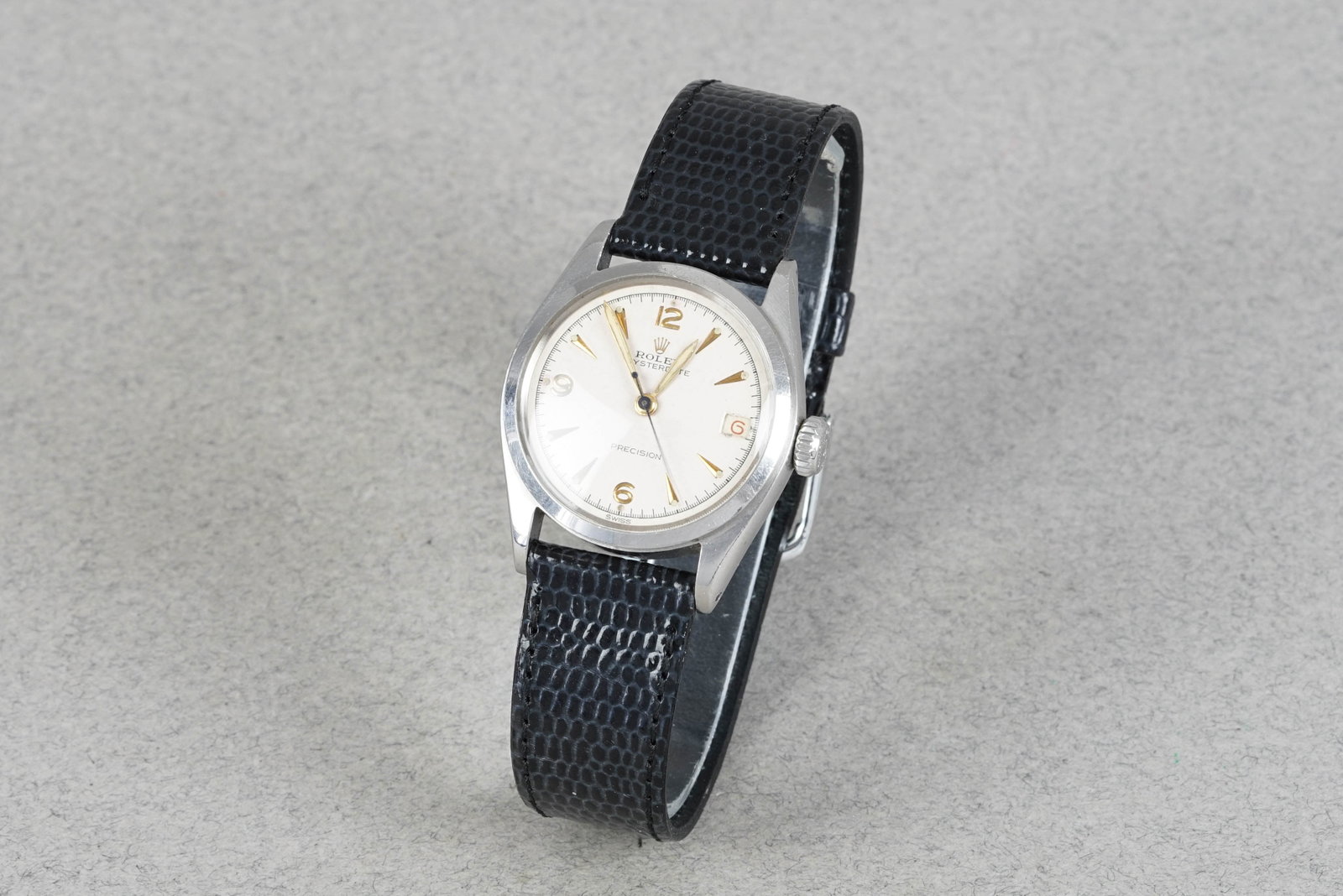 ROLEX OYSTERDATE PRECISION REF. 6066 CIRCA 1953: ROLEX OYSTERDATE PRECISION REF. 6066 CIRCA 1953 DIAL: Circular off white dial, red date wheel cone hour markers CASE: 30mm stainless steel case, super oyster Rolex crown not screw in MOVEMENT: