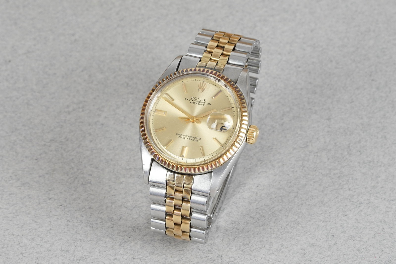 ROLEX DATEJUST OYSTER PERPETUAL DATEJUST STEEL & GOLD REF. 1601 CIRCA 1970: ROLEX DATEJUST OYSTER PERPETUAL DATEJUST STEEL & GOLD REF. 1601 CIRCA 1970 DIAL: Champagne dial, applied baton indices, hands with Lume, date window at 3 o'clock CASE: 36mm stainless steel and