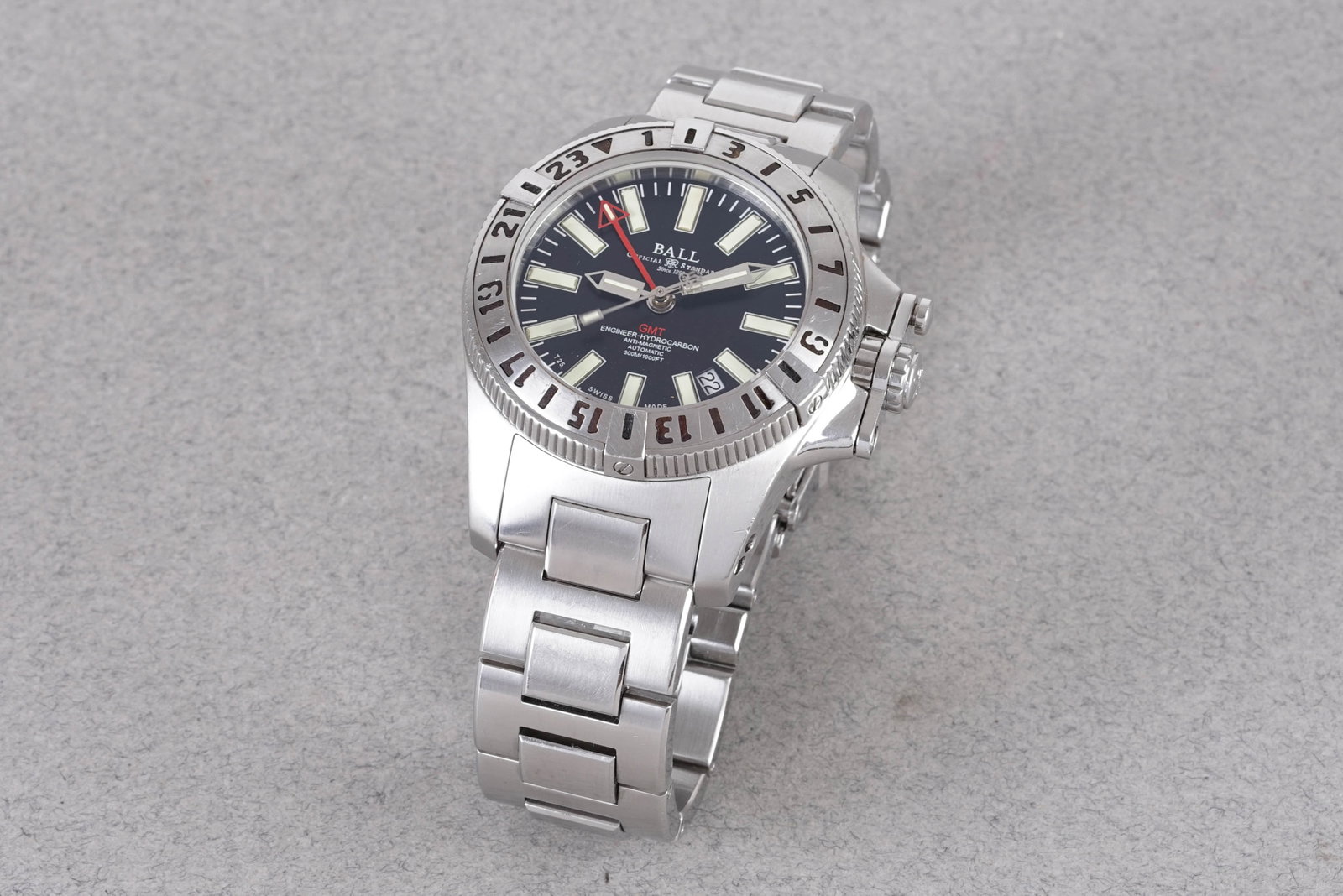 BALL GMT ENGINEER HYDROCARBON W/ BOX & PAPERS REF. DG1016A-S1J-BK CIRCA 2007: BALL GMT ENGINEER HYDROCARBON W/ BOX & PAPERS REF. DG1016A-S1J-BK CIRCA 2007, this watch is a ref. DG1016A-S1J-BK and is fitted with a circular black dial with hour markers and hands. The 39mm
