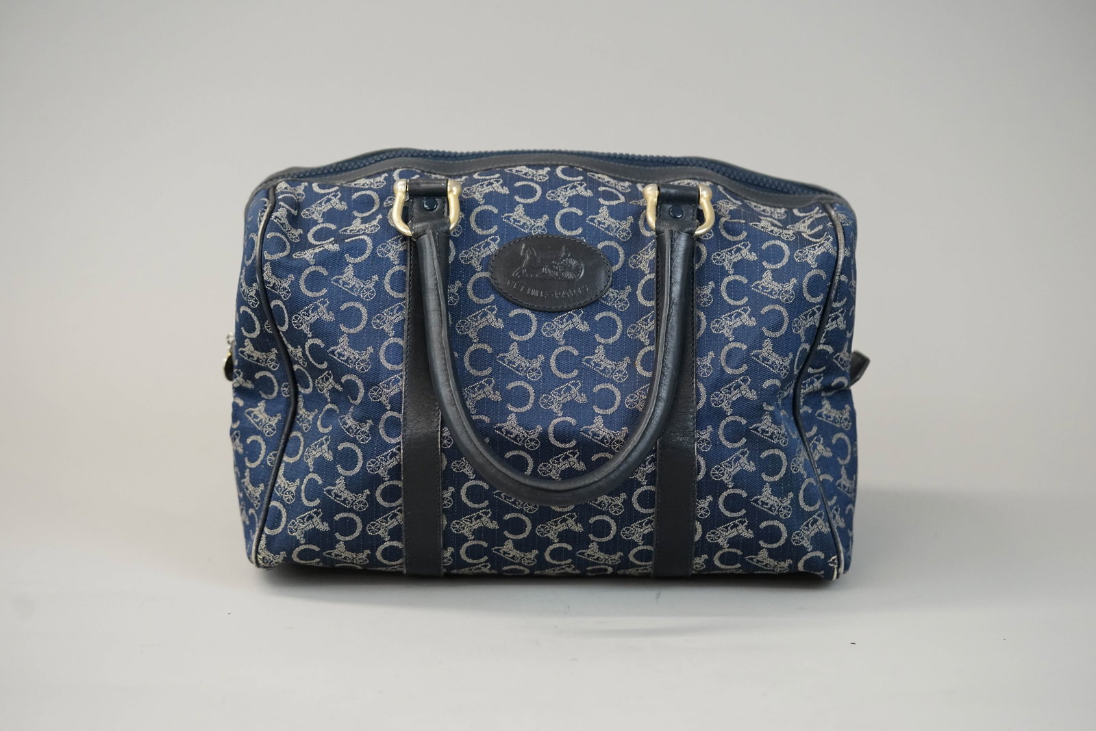 CELINE MONOGRAM HANDBAG: CELINE MONOGRAM HANDBAG DIMENSIONS: Width 30cm, height 19cm, depth 17cm COLOUR: Bluebr> MATERIAL: Canvas leather trim ACCESSORIES: n/a CONDITION RANK:BC If you have any questions regarding this