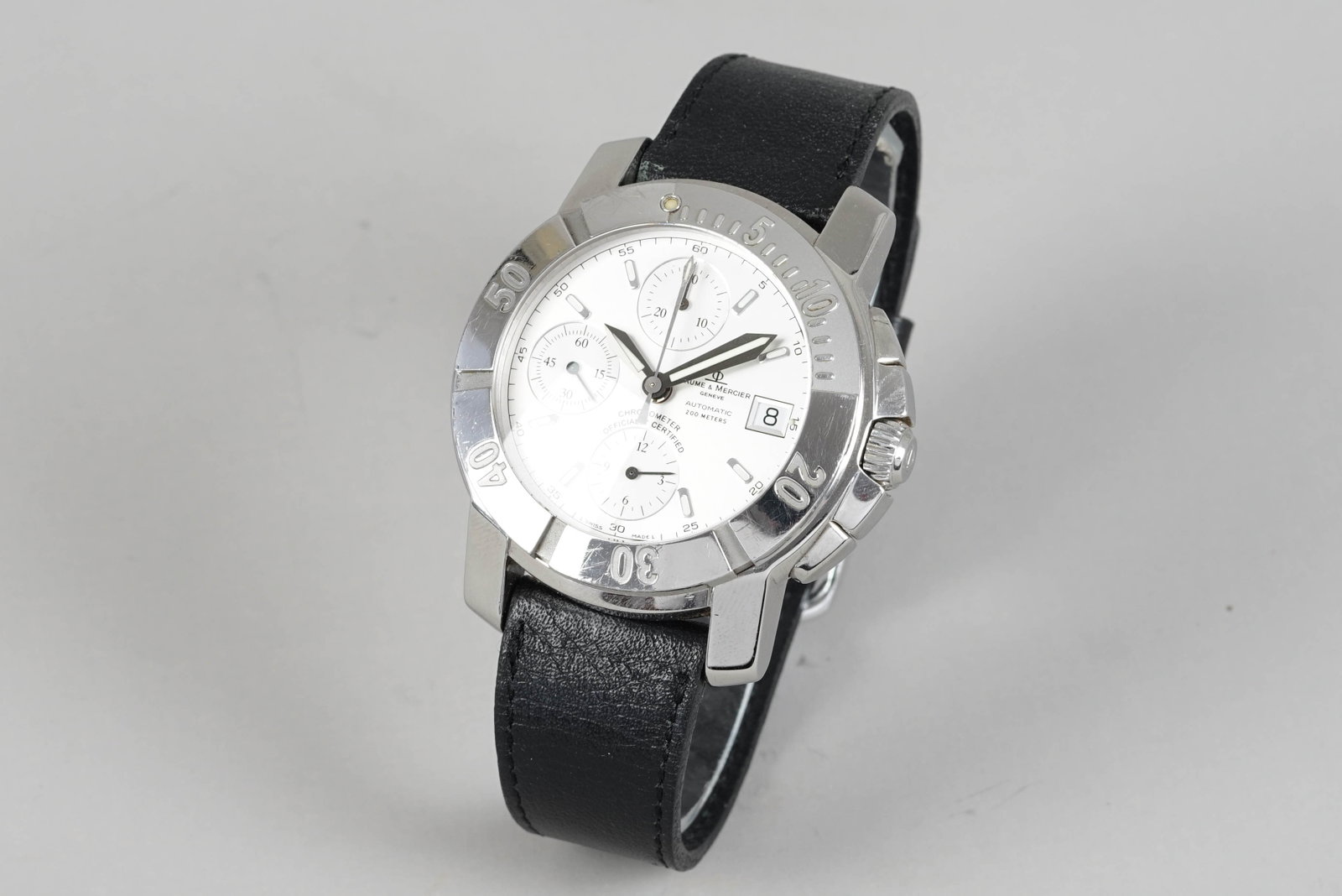 *NO RESERVE* BAUME & MERCIER CAPELAND AUTOMATIC DATE CHRONOGRAPH: BAUME & MERCIER CAPELAND AUTOMATIC DATE CHRONOGRAPH DIAL: Circular silver triple register dial, date window CASE: 40mm stainless steel case, crown, twin pushers, screw down case back MOVEMENT: