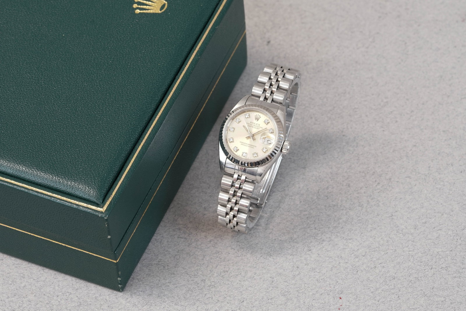 ROLEX OYSTER PERPETUAL DATEJUST DIAMOND SET DIAL REF. 69174G CIRCA 1990: ROLEX OYSTER PERPETUAL DATEJUST DIAMOND SET DIAL REF. 69174G CIRCA 1990 DIAL: Circular white dial, diamond set hour markers, baton hands, date window CASE: 26mm steel case, screw case back, Rolex
