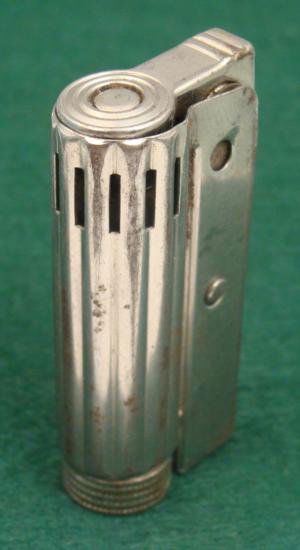 WWII GERMAN SOLDIERS STEEL CIGARETTE LIGHTER: HERE IS A FASCINATING GI BRINGBACK. IT IS A NAZI SOLDIER'S LIGHTER THAT IS MADE OUT OF STEEL. THERE IS A SNAP OPEN TOP. THE ROUND PORTION OF BOTTOM PULLS OUT. THE LIG