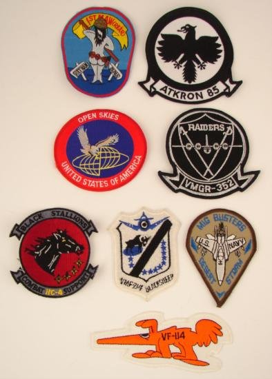 Lot 8 Military United States PATCHES Navy 1980s 1990s: This is an 8 piece lot of U.S. Navy Patches from the 1980's and 1990's. The patches come in a wide range of sizes, shapes and colors. Included in this lot: Raiders VMGR-352 Patch Partially circular, 4