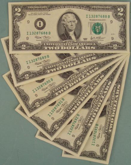 6 Consec Number 2003 $2 Bills Notes I Mint Mark CU: (6) 2003 $2 bills, with consecutive serial numbers Grade: Crisp, UncirculatedMint mark: I (Minneapolis)*The serial numbers you will receive are different from those in the photo