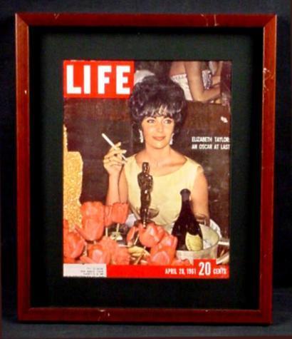 Glamorous Elizabeth Taylor Oscar LIFE 1961 Cover Framed: This handsome "shadow box" frame perfectly sets off a great photo of the glamorous Elizabeth Taylor at the thirty-third Academy Awards ceremony held on April 17, 1961 at the Santa Monica Civic Auditor