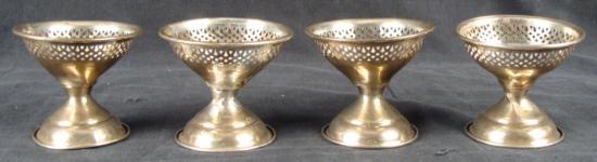 4 STERLING SILVER Pierced Hollowware Cup Holders 37 GMs: Offered here is a collection of four pierced hollowware sterling silver cups. They measure 2.75" tall by 2.75" in diameter. These cups show extensive denting and wear but are suitable for display or s