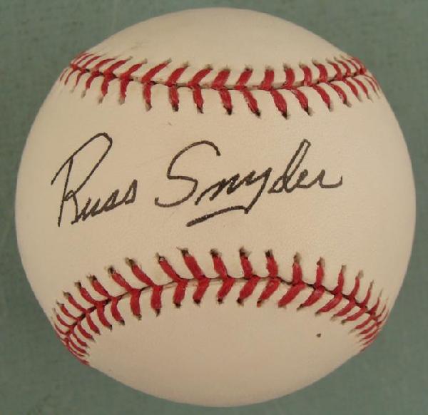 Russ Snyder Signed Baseball KC Athletics MLB Ball: This baseball was signed by former Major League outfielder Russ Snyder. The autograph is in black ballpoint. The ball is a Rawlings Official Major League Selig model. It is in excellent condition, wit