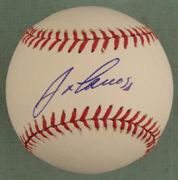 Jose Canseco Signed Baseball MLB All Star w/ Photo: This baseball was signed by All Star former outfielder Jose Canseco. The autograph is in blue ballpoint. The ball is a Rawlings Major League Selig model. It is in excellent condition. Despite being in