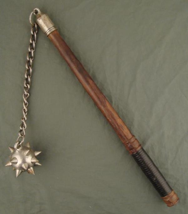 MEDIEVAL FLAIL WITH BALL & SPIKES-WELL MADE-WOOD HANDLE: WELL MADE MEDIEVAL TYPE SPIKED BALL FLAIL. NICE 60'S MUSEUM COPY. WOOD HANDLE IS 21" INCLUDING METAL CAP. METAL CHAIN & 3" DIAMETER BALL, VERY SHARP. 