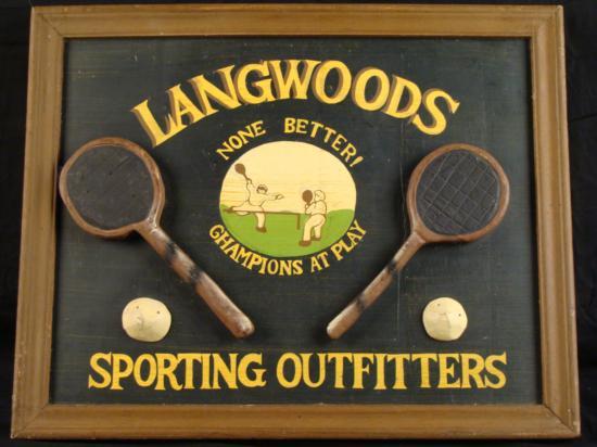 Classic Tennis Ad Sign Langwoods Sporting Outfitters: Here is a very nice sports sign. This sign was made to look vintage with painted lettering and glued on 3-D racket and tennis balls. The racket and tennis balls are appearently made o