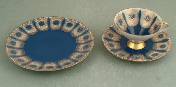3 Pc Bavarian 1950s Turquoise & Gold Teacup, Plate: This 3 piece Bavarian tea grouping has fancy gold designs and rich turquoise coloring on white porcelain. These are in very good condition, with no chips or cracks, and only some minor scuffs from use
