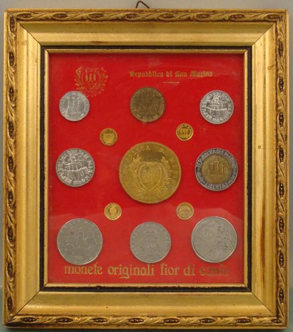 Framed Original 13 Dif Coins San Marino Italy 1898-1980: 13 Different Coins from San Marino, the oldest and smallest republic in the world, located in North Central Italy. The small coins may be gold tokens. The visible dates are 1898, 1975, 1976 and 1980.&