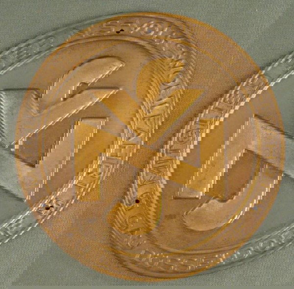 NAZI GAU DUSSELDORF WELFARE MEMBER DOOR PLAQUE INSIGNIA: 3" DIAMETER NAZI BRASS WELFARE MEMBER'S DOOR PLAQUE FROM GAU DUSSELDORF WITH SWASTIKAS-ORIGINAL & RARE. 3" IN DIAMETER.