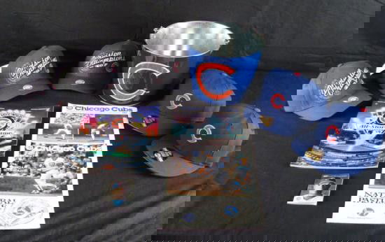 Chicago Cubs MLB- Hats Ice Bucket Program Scorecards: This is a very nice Chicago Cubs lot. First we have three 2007 Chicago Cubs Division Champions hats. Each of them are youth size and are in very good condition. Th