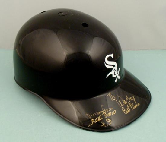 Minnie Minoso Signed Chicago White Sox Baseball Helmet: Here is a signed helmet by Minnie Minoso. He signed it with a gold pen on the helmets lip. On the lip it says: To Wayne, Best Wishes also in gold pen. On the back of the helmet 