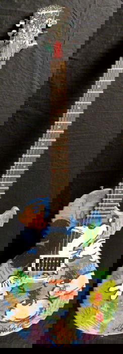 Duerrstein Orig Art Painted Mickey Mouse Gibson Guitar: This genuine Epiphone Gibson electric guitar has been turned into a work of animation art, featuring the beloved Mickey and Minnie Mouse! The original art was done by artist Dick Duerrstein, who knows